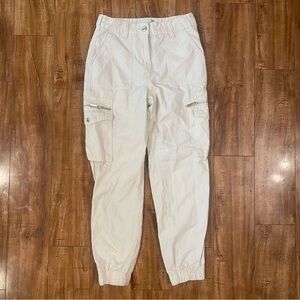 AMISU Women’s Cream Khaki Cargo Pants Elastic Cuffs Hip Pockets Size 2